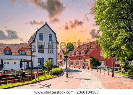 Idyllic city of Greetsiel, Lower Saxony, Germany  Royalty-Free Stock Photo #2368104389
