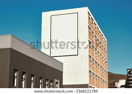 Building, city with mockup space and billboard for advertising, commercial product or logo. Empty poster for brand marketing, multimedia and communication with announcement, urban and banner outdoor
