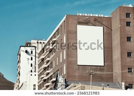 Building, mockup space and advertising banner, commercial product or logo design in city. Empty poster for brand marketing, multimedia and communication with announcement, urban and billboard outdoor
