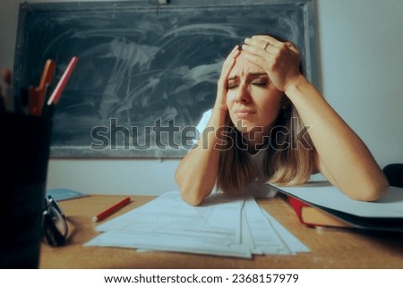 

Stressed Teacher Grading Papers Suffering a Migraine. Unhappy professor have many assignments to evaluate
 Royalty-Free Stock Photo #2368157979