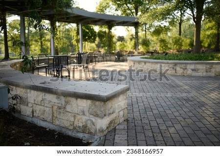 THE WOODLANDS, TEXAS - JULY 24th 2023: background settings for outdoor portraits by Lake Woodlands. The lake waters are tranquil, the fall colors are spectacular, there are hidden paths and benches