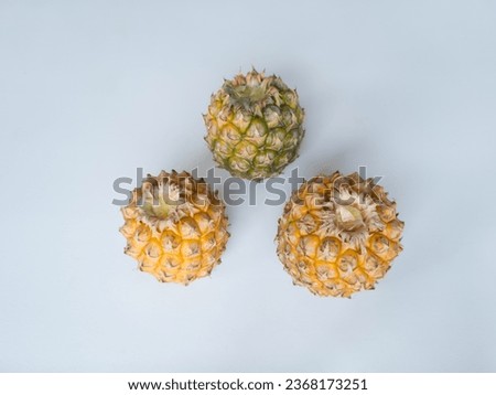 Ripe, unpeeled pineapple contains many vitamins and minerals