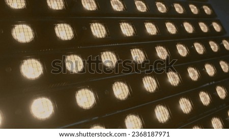 LED panel. Stock footage. Glowing panel with LED lights. LED panel for illumination of filming or shows. Equipment for lighting shows and filming