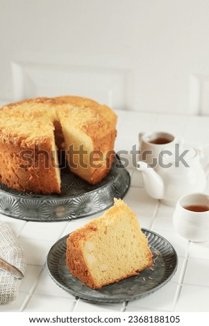 Soft and Fluffy Cheese Chiffon Cake on White Table  Royalty-Free Stock Photo #2368188105