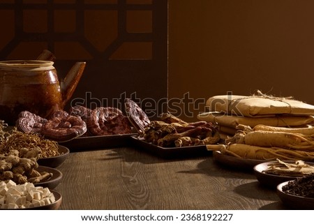 Scene for medicine advertising, photography traditional medicine content. Brown background with folk medicines on trays displayed on wooden table. Blank space for text and design Royalty-Free Stock Photo #2368192227