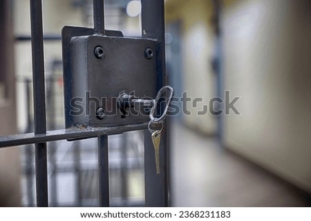 Key to the entrance grate in a prison. Prison. Royalty-Free Stock Photo #2368231183