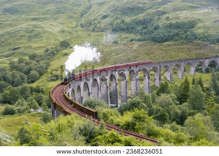 jacobite steam train glenfinnan viaduct view point Royalty-Free Stock Photo #2368236051
