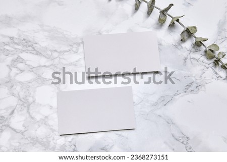 Modern business card mockup template with clipping. Design presentation layouts for corporate identity, advertising, personal, stationery over marble background. Concept of business, entrepreneurship.