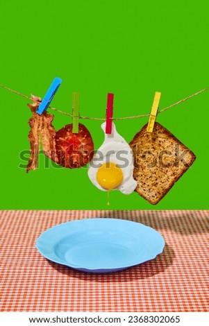 Ingredients. Fried egg, bacon, tomato and sandwich hanging over plate on green background. Concept of breakfast, food, taste, health, creativity. Pop art photography. Poster. Copy space for ad