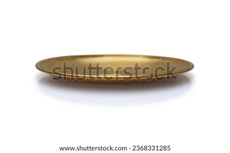 Front view of golden plate isolated on white background. Empty gold round flat plate with shadow. Mock up template for food poster design. Royalty-Free Stock Photo #2368331285