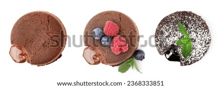 Set of yummy fondant cakes with hot chocolate isolated on white, top view Royalty-Free Stock Photo #2368333851