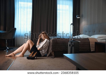 Photo of thoughtful woman in modern room Royalty-Free Stock Photo #2368358105