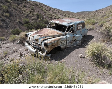 An Old Rusty Blue Classic Car Abandoned in Death Valley National Park