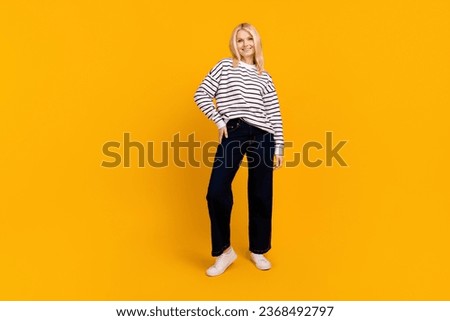 Full length photo of cute adorable lady wear fashionable clothes posing isolated bright color background