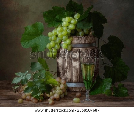 Still life with white wine glass and grapes