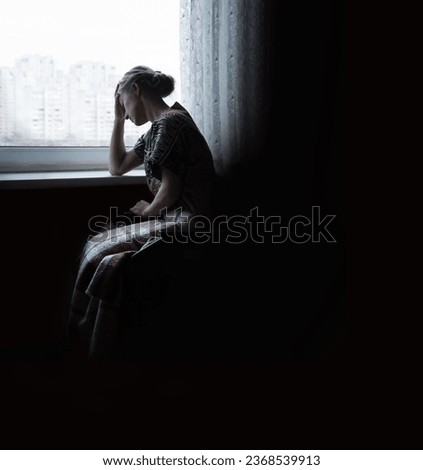 Adult poor sick ill holy devote lady seat dark old cold home room light white war city sky text space. sullen fail fear frown sit teen human face beg hand ask god Jesus Christ wait love hope concept Royalty-Free Stock Photo #2368539913