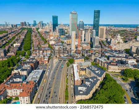 Boston Back Bay skyline and Interstate Highway 90 including John Hancock Tower, Prudential Tower, and One Dalton Street building in Boston, Massachusetts MA, USA.  