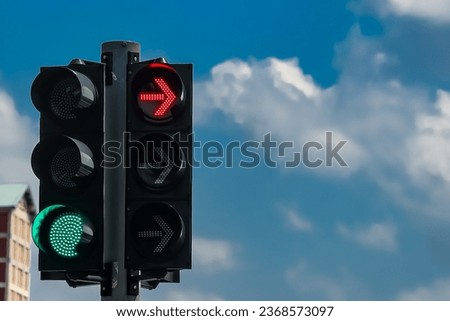 SINGAPORE - 27 SEP 2023: Red arrow means no turning right. SIGNALISED TURNS at most road junctions, replacing discretionary right turns reduce traffic accidents. Royalty-Free Stock Photo #2368573097