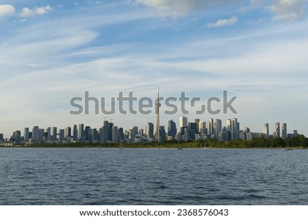 Toronto skyline with blue sky and clouds