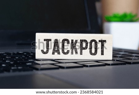 Wooden Blocks with the text: Jackpot. Royalty-Free Stock Photo #2368584021