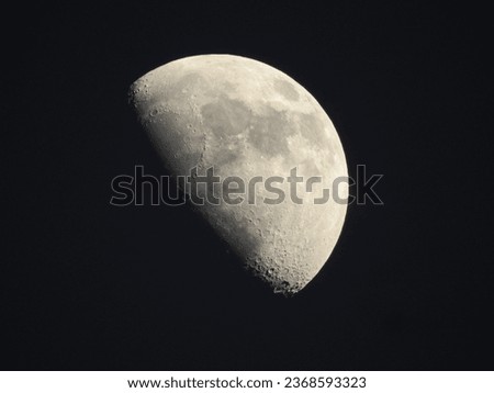 A waxing crescent moon graces the night sky with its gentle glow, a celestial crescent in the velvet darkness, promising the magic of a new lunar cycle. Royalty-Free Stock Photo #2368593323