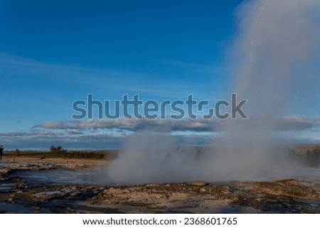 Strokkur, a fountain-type geyser located in a geothermal area beside the Hvítá River, southwestern Iceland, east of Reykjavík. It typically erupts every 6–10 minutes. Part of The Golden Circle Tour. Royalty-Free Stock Photo #2368601765