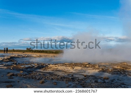 Strokkur, a fountain-type geyser located in a geothermal area beside the Hvítá River, southwestern Iceland, east of Reykjavík. It typically erupts every 6–10 minutes. Part of The Golden Circle Tour. Royalty-Free Stock Photo #2368601767