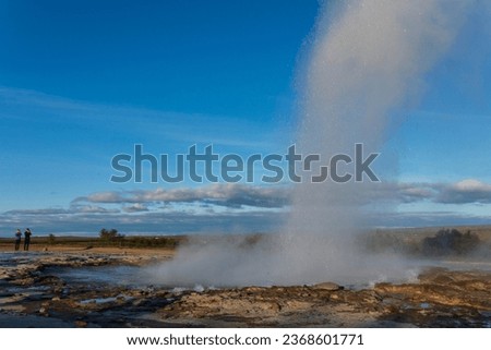 Strokkur, a fountain-type geyser located in a geothermal area beside the Hvítá River, southwestern Iceland, east of Reykjavík. It typically erupts every 6–10 minutes. Part of The Golden Circle Tour. Royalty-Free Stock Photo #2368601771