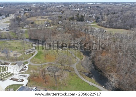 Aerial drone photograph of a park located in Auburn Hills Michigan. Photo was captured in the early winter time after the leaves have already fallen. Birds Eye view from above Royalty-Free Stock Photo #2368622917
