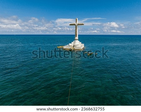 Sunken Cemetery in Camiguin Island. Group of boat floating over the sea. Philippines. Royalty-Free Stock Photo #2368632755
