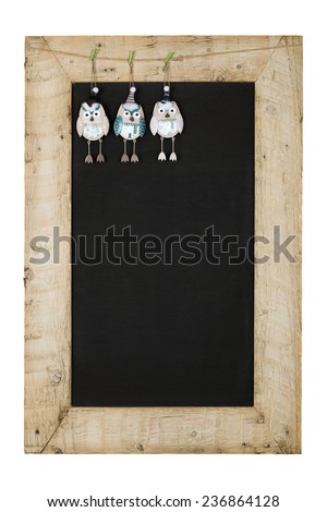 Merry Christmas and Happy New Years chalkboard blackboard tin owl decoration restaurant vintage menu design on painted reclaimed wooden frame isolated on white with copy space