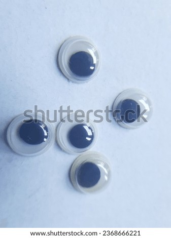 Cute plastic eyes for toys and dolls  isolated on white background.