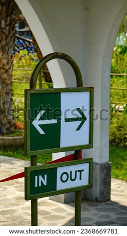 Signage photos at several points in the outdoor and indoor areas in green color look eye-catching with bold fonts and logos.