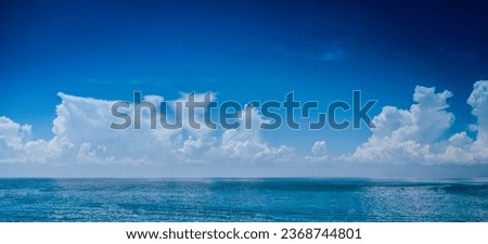 The photo showing the sea and the sky is blue, it looks very beautiful.