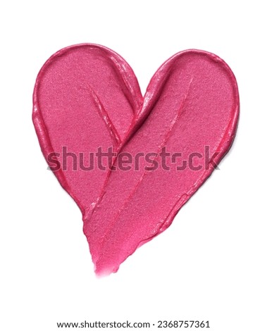 Pink lipstick shimmering texture in heart shape, texture stroke isolated on white background. Cosmetic product smear smudge swatch Royalty-Free Stock Photo #2368757361