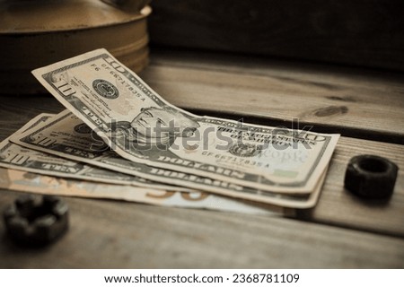 dollars on a wooden background, background