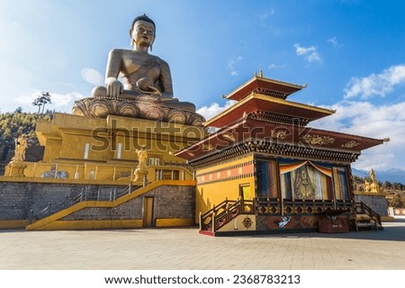 The Great Buddha Dordenma is sited amidst the ruins of Kuensel Phodrang in Thimphu, Bhutan Royalty-Free Stock Photo #2368783213