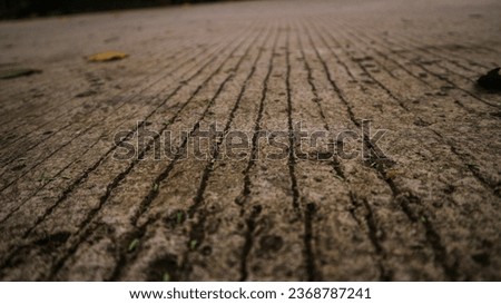 A concrete road in the close up photo
