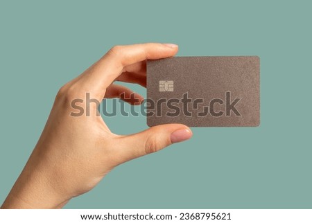 Hands holding bank card mock up, plastic mockup Royalty-Free Stock Photo #2368795621