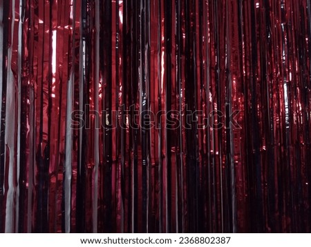 Fringe Red Foil, which was seen at a party, looks like a great photo spot! . 30 September 2023 Royalty-Free Stock Photo #2368802387