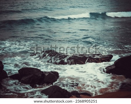 Slow shutter image of waves creating a smooth silky effect