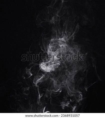 White smoke, creative and art on black background, fog and pattern in vapor, mist and incense. Fumes, smog and steam or air, gas and dry ice effect in abstract, artistic and pollution with mystery Royalty-Free Stock Photo #2368931057