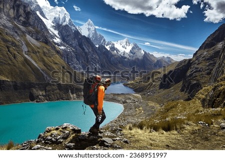 Trekking in the Huayhuash Mountain Range is a popular and breathtaking adventure for outdoor enthusiasts Royalty-Free Stock Photo #2368951997