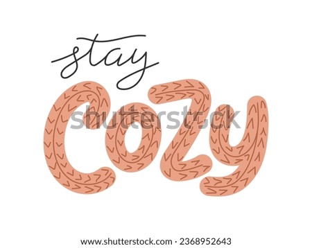 Stay cozy handwritten lettering text. Letters drawn with knitted decor. cozy winter autumn background. Design element Royalty-Free Stock Photo #2368952643
