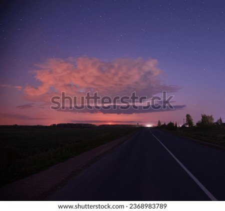 a long road with a sunset in the distance, night sky photography,