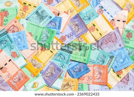 Malaysia currency of Malaysian ringgit banknotes background. Paper money of one, five, ten, twenty, fifty and hundred ringgit notes. Financial concept. Royalty-Free Stock Photo #2369022433