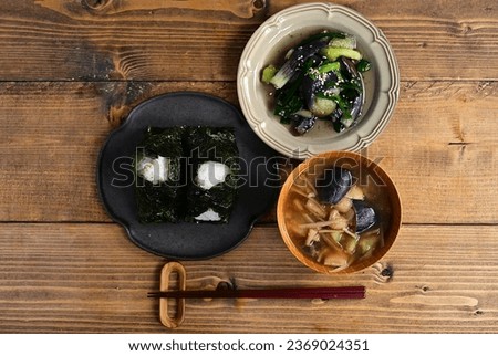 rice ball, side dish and miso soup