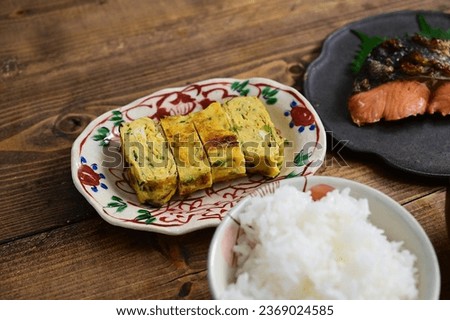 one soup and two dishes grilled salmon and tamagoyaki