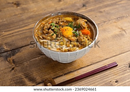 soumen noodles covered with curry 