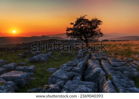 Beautiful sunset at the Winskill Stones near Settle in the Yorkshire Dales Royalty-Free Stock Photo #2369040393